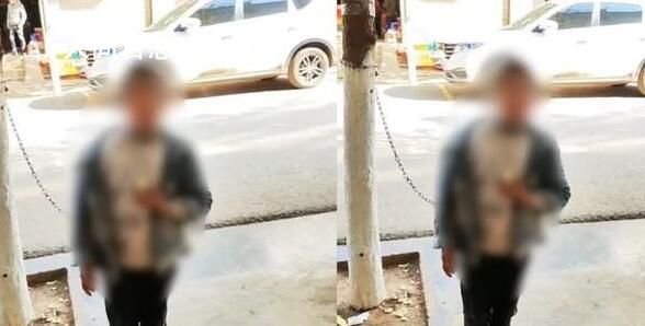 云南一男孩被铁链套脖锁树旁，这个男孩为何会受到此待遇？
