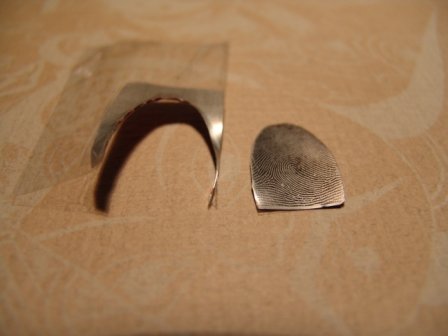 如何对付指纹打卡机