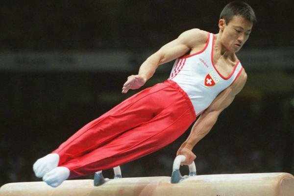 中国第一枚奥运会体操金牌获得者是