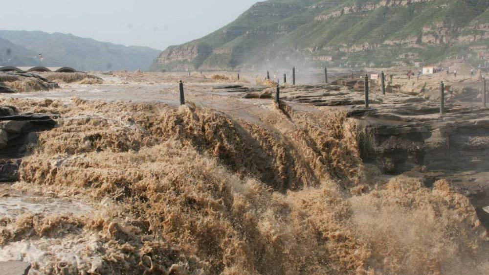 50万建的新房被洪水冲倒，此次事件是否会得到赔偿？