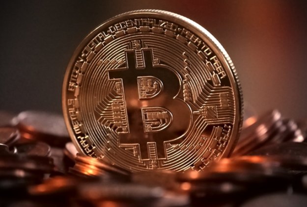 比特币再次涨破58000美元，爆仓金额达到多少？